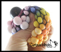 1 Rainbow Mesh Doh Filled Squeeze Balls - Doh - Ultra Squish